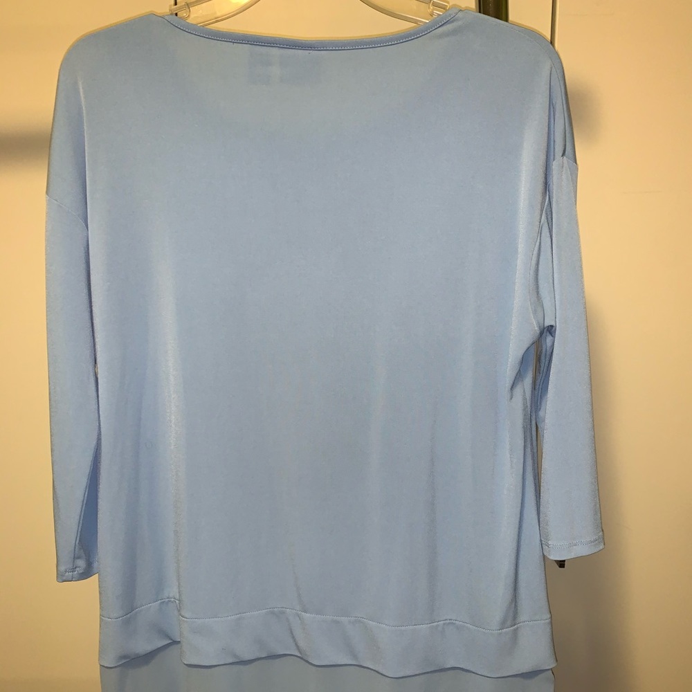 Light blue top